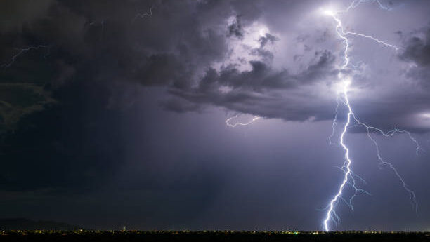 Powerful lightning strike from a monsoon thunderstorm in Arizona.